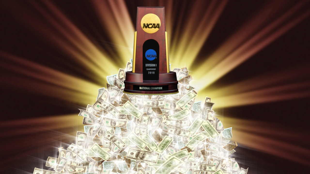 The NCAA Tournament national championship trophy atop a pile of money