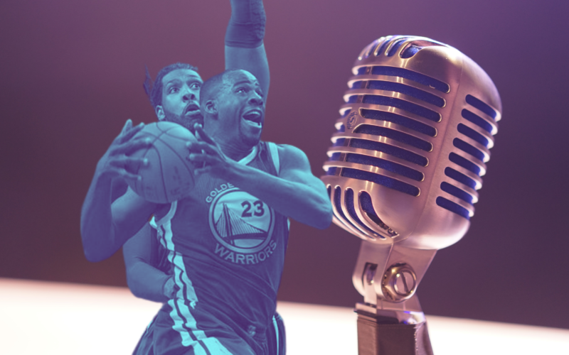 Warriors F/C Draymond Green depicted next to a broadcaster's microphone