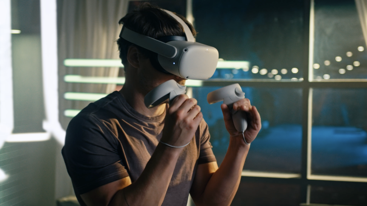 A man wearing a Meta Quest VR headset using the Liteboxer VR exercise system