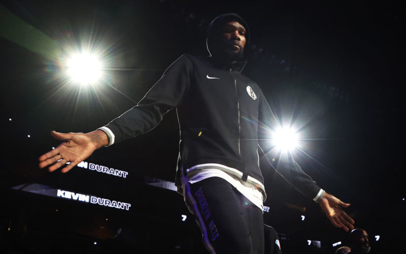 Basketball player Kevin Durant entering a game from the sideline for the Brooklyn Nets