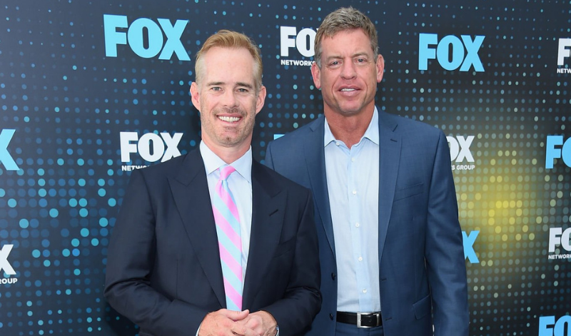 NFL broadcasters Joe Buck and Troy Aikman posing for the camera at a red carpet event in New York