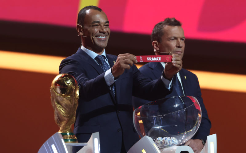 Brazil legend Cafu drawing a piece of paper displaying France's name at the FIFA World Cup Draw 2022