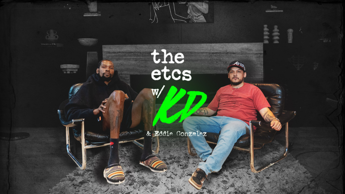 Basketball player Kevin Durant seated in a chair next to podcast co-host Eddie Gonzalez