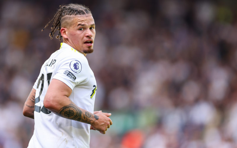 Footballer Kalvin Phillips looking back over his right shoulder while running on a soccer pitch