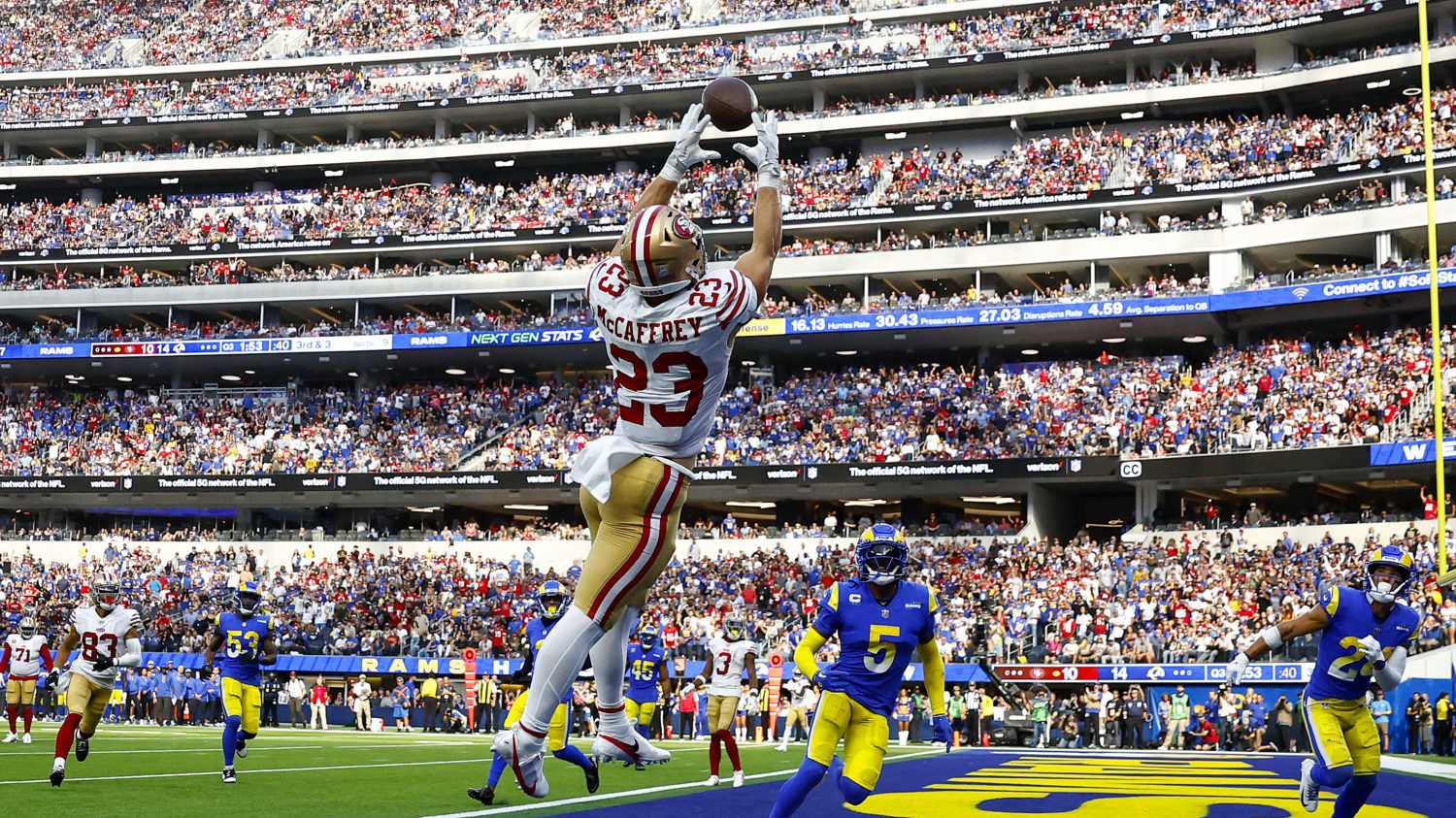 John Taylor runs with the ball for the San Francisco 49ers in Super News  Photo - Getty Images